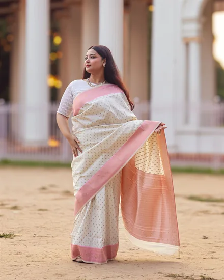 A young woman modelling a sari outdoors