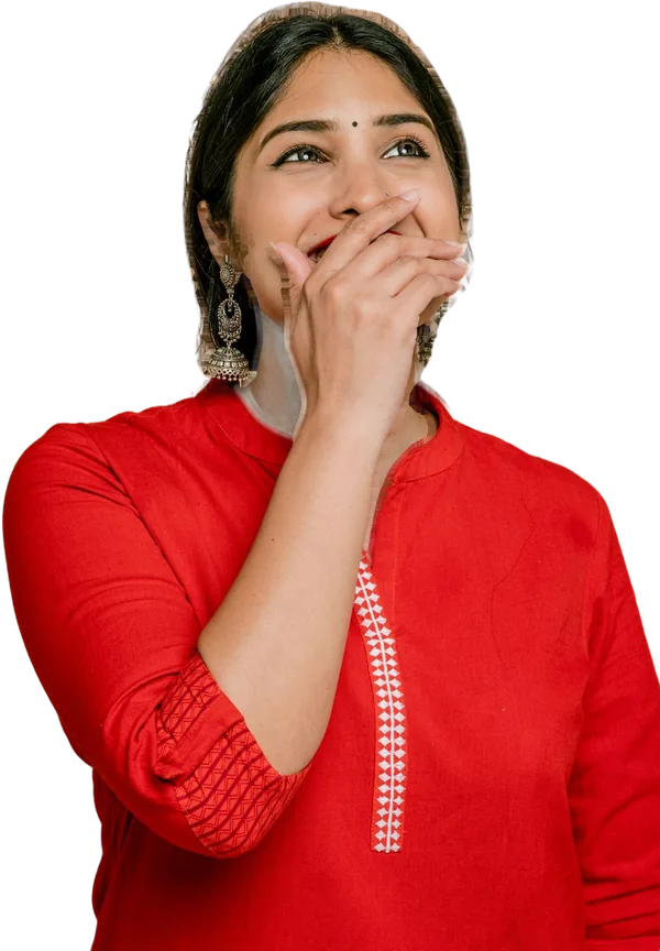 A laughing woman in red