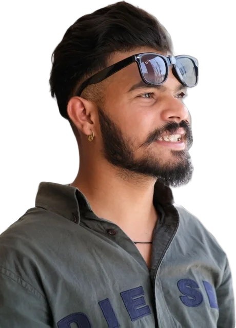 A man with sunglasses pushed up on his head
